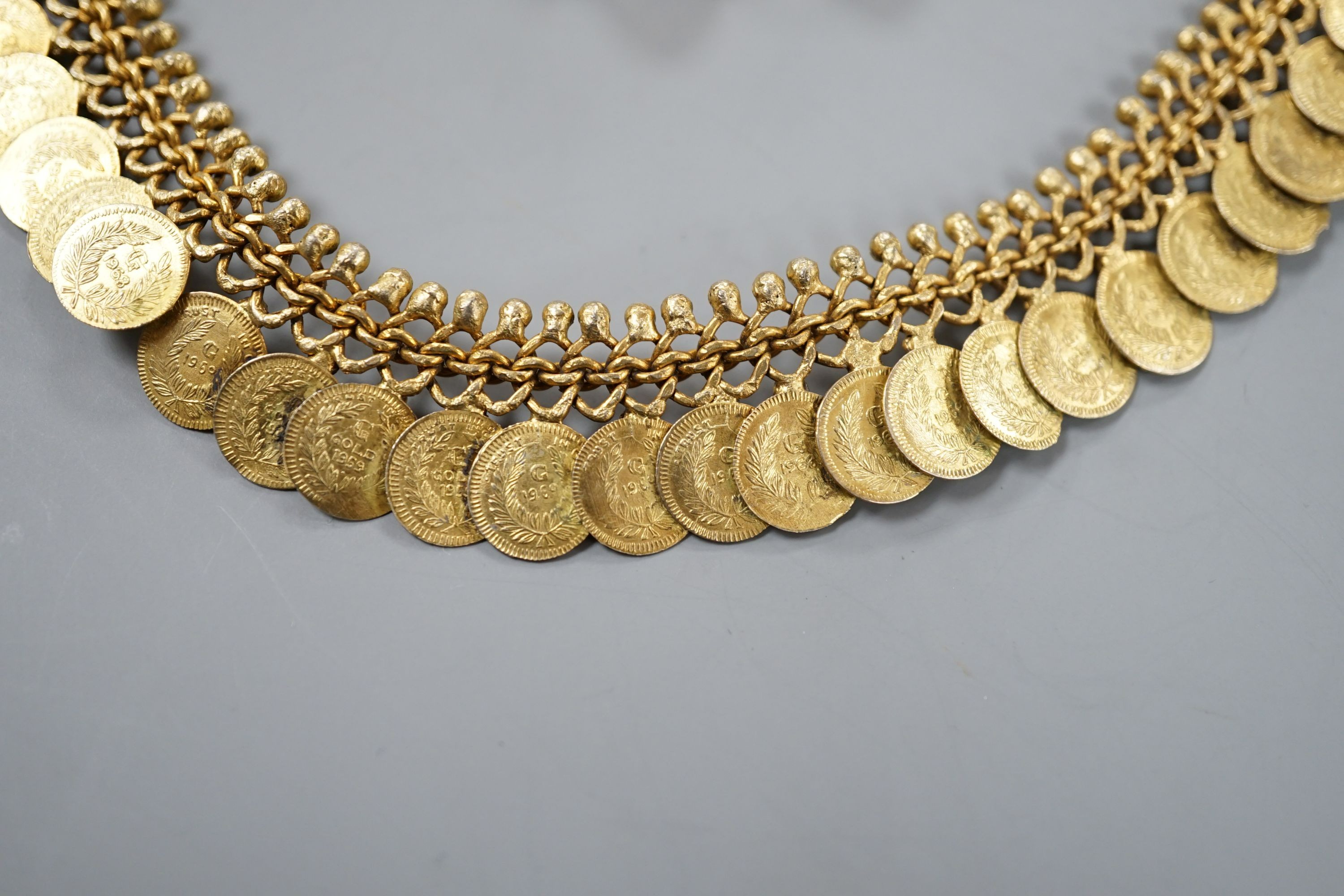 A pair of yellow metal novelty earrings, modelled as pouring vessels, 26mm, 4.3 grams and a gilt metal 'coin' necklace.